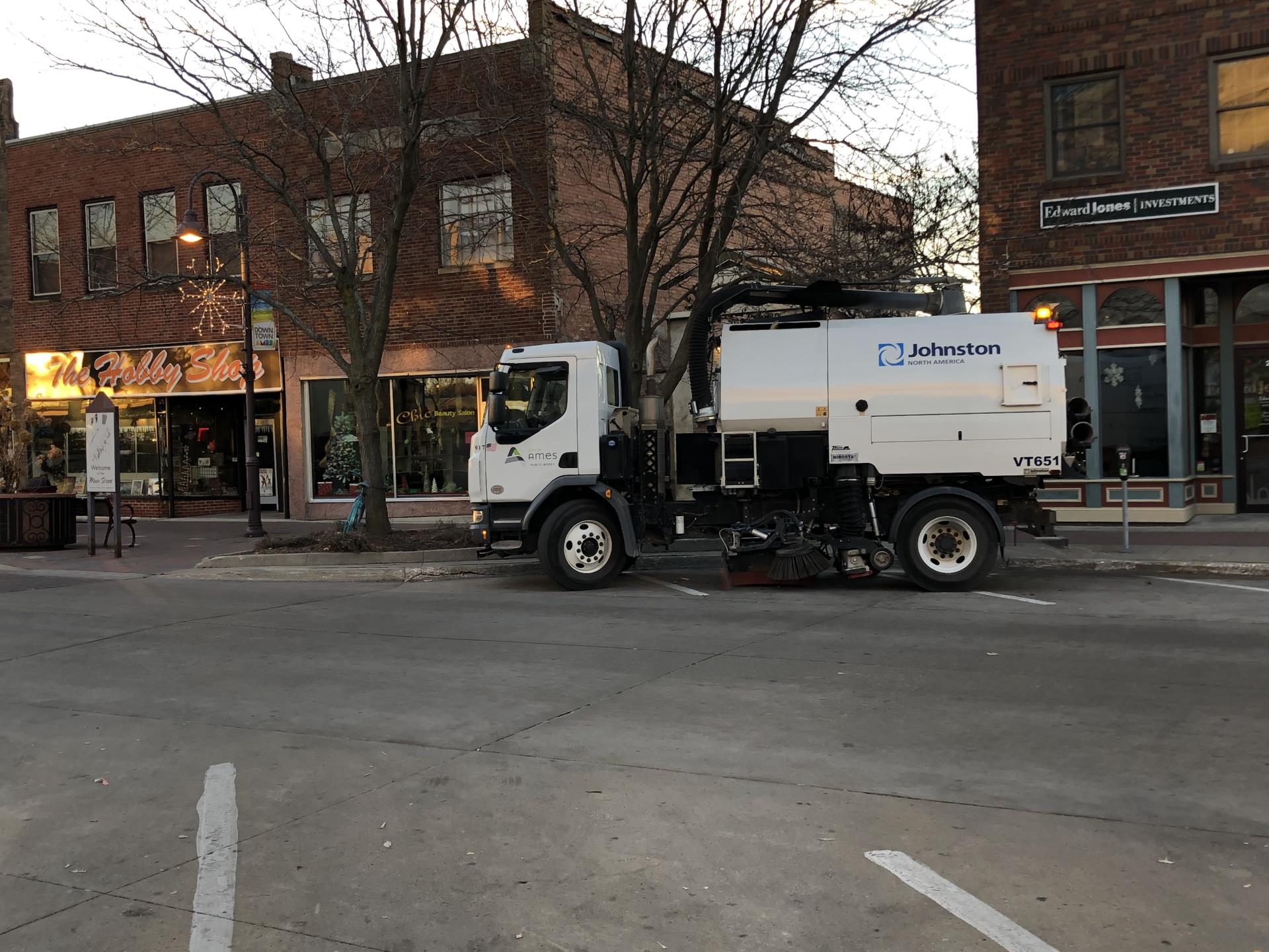 City of Ames street cleaner cleaning Main Street.