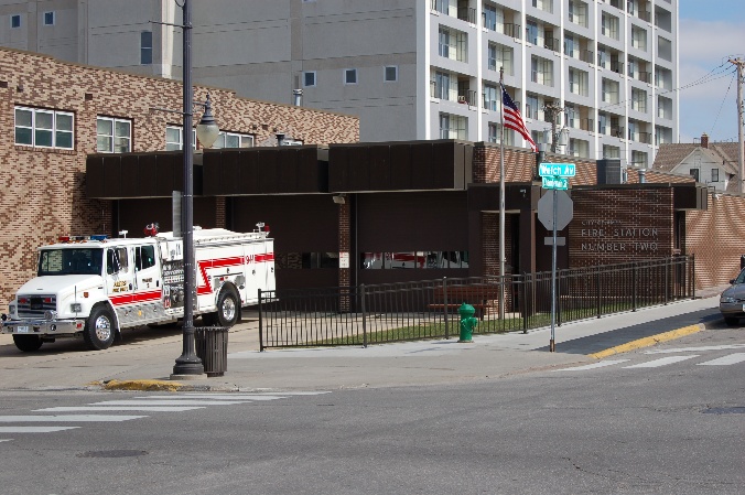 Rebuilt fire Station #2 with a fire truck sitting outside. 