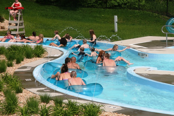 Swimmers on tubes in the lazy river