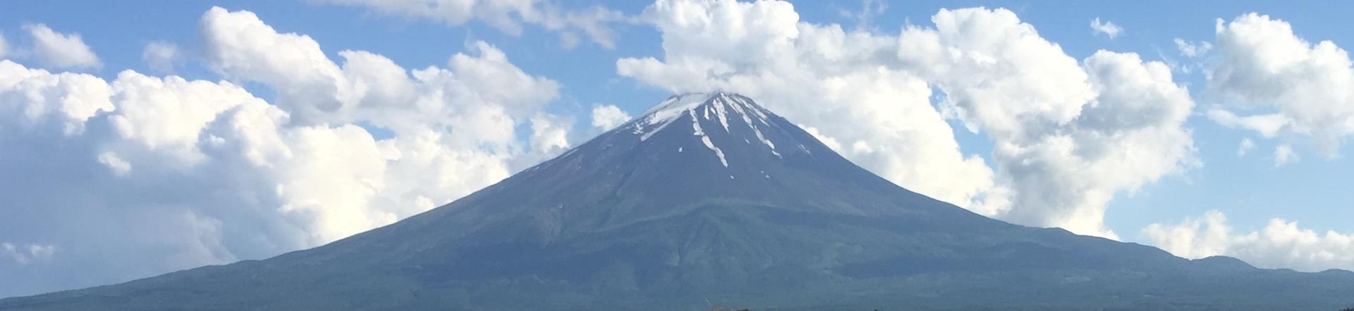 Inactive volcano with snow at the top